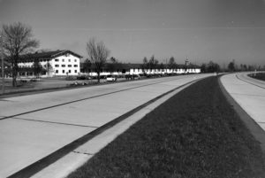 View of the city hall area with parking cars at the Chiemsee, Germany 1930s. View of the city hall area with parking cars at the Chiemsee, Germany 1930s.