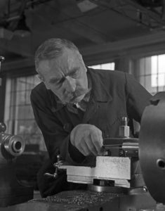 Worker at a factory hall at Mercedes Benz in Stuttgart, Germany 1930s. Worker at a factory hall at Mercedes Benz in Stuttgart, Germany 1930s.