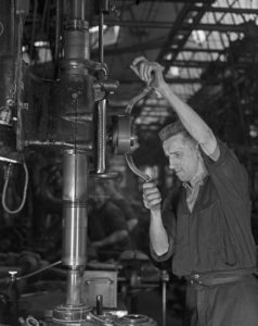 Worker at a factory hall at Mercedes Benz in Stuttgart, Germany 1930s. Worker at a factory hall at Mercedes Benz in Stuttgart, Germany 1930s.