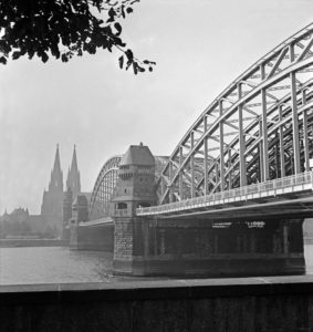 View from Deutz to Hohenzollern railway bridge and cathedral of Cologne, Germany 1930s. View from Deutz to Hohenzollern railway bridge and cathedral of Cologne, Germany 1930s.