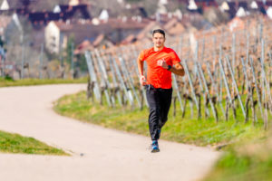Man, 21 years old, jogging on Kappelberg, Remstal, Baden-Württemberg, Germany Man, 21 years old, jogging on Kappelberg, Remstal, Baden-Württemberg, Germany