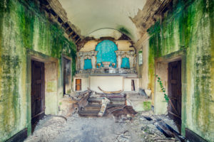 small chapel with altar and green walls small chapel with altar and green walls
