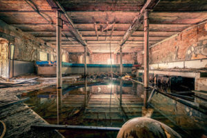 a deserted disco with disco ball and water reflection a deserted disco with disco ball and water reflection