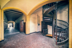 circular staircase and floor in a derelicted castle, abandoned for decay circular staircase and floor in a derelicted castle, abandoned for decay