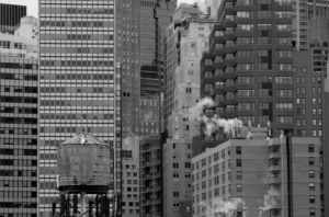 Manhattan skyline, New York City, USA, water tower in foreground Manhattan skyline, New York City, USA, water tower in foreground