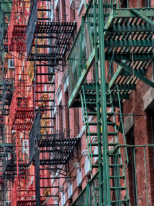 Fire exit stairs on typical New York brick buildings in Manhattan, New York City, USA Fire exit stairs on typical New York brick buildings in Manhattan, New York City, USA