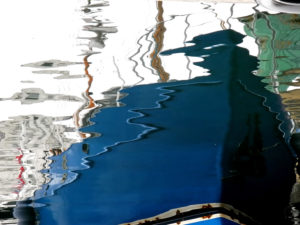 A boat reflecting in the harbor of Bergen, Norway, A boat reflecting in the harbor of Bergen, Norway,