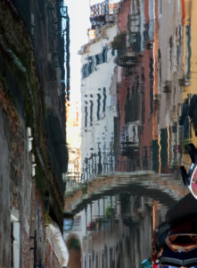 Water reflection in a canal in Venice, Italy Water reflection in a canal in Venice, Italy