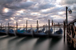 Gondolas in the lagoon of Venice, sunrise, Italy Gondolas in the lagoon of Venice, sunrise, Italy