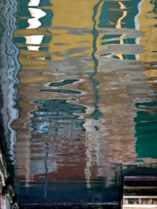 Water reflection in a canal in Venice, Italy Water reflection in a canal in Venice, Italy