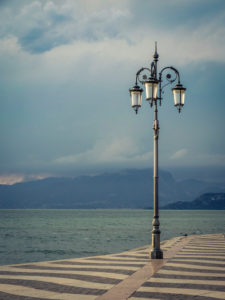 Thunderstorm on Lake Garda: Lantern on the shore of Lazise Thunderstorm on Lake Garda: Lantern on the shore of Lazise