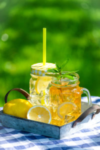 Tray of homemade iced tea on a garden table Tray of homemade iced tea on a garden table