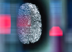 Finger print on digital screen being scanned Finger print on digital screen being scanned
