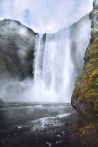 Skógafoss, Dramatic, 60m waterfall on a rocky cliff, Iceland Skógafoss, Dramatic, 60m waterfall on a rocky cliff, Iceland