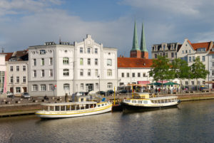 City trave with old town and towers of the cathedral, Lübeck, UNESCO World Heritage, Schleswig-Holstein, Germany City trave with old town and towers of the cathedral, Lübeck, UNESCO World Heritage, Schleswig-Holstein, Germany