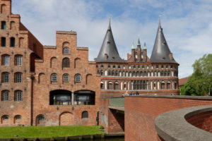 Historic salt store and Holsten Gate in the old town of Luebeck, UNESCO World Heritage, Luebeck, Schleswig-Holstein, Germany Historic salt store and Holsten Gate in the old town of Luebeck, UNESCO World Heritage, Luebeck, Schleswig-Holstein, Germany