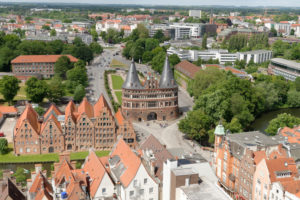 View of the old town with the Holsten Gate and the historic salt store in Lübeck, UNESCO World Heritage, Lübeck, Schleswig-Holstein, Germany View of the old town with the Holsten Gate and the historic salt store in Lübeck, UNESCO World Heritage, Lübeck, Schleswig-Holstein, Germany