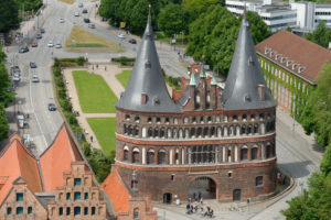 View of the old town with the Holsten Gate and the historic salt store in Lübeck, UNESCO World Heritage, Lübeck, Schleswig-Holstein, Germany View of the old town with the Holsten Gate and the historic salt store in Lübeck, UNESCO World Heritage, Lübeck, Schleswig-Holstein, Germany