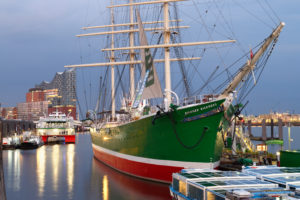 Sailing ship Rickmer Rickmers at the St. Pauli Landungsbrücken with the Elbphilharmonie in HafenCity in the evening light, Hamburg, Elbe, Hanseatic City, Port of Hamburg, Hamburg, Germany Sailing ship Rickmer Rickmers at the St. Pauli Landungsbrücken with the Elbphilharmonie in HafenCity in the evening light, Hamburg, Elbe, Hanseatic City, Port of Hamburg, Hamburg, Germany