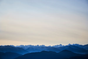 Over the clouds on the Sonntratn near Gaißach in Bavaria, chilly autumn mood, valley in the fog, mountains over the clouds