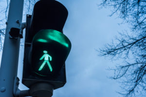 A pedestrian crossing light in the evening hours at the Friedrich square, Mannheim, Baden Wurttemberg, Germany A pedestrian crossing light in the evening hours at the Friedrich square, Mannheim, Baden Wurttemberg, Germany
