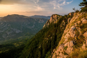 Evening sun over the mountain range over the canyon of the river Tara, Zabljak, Durmitor National Park, Montenegro. Evening sun over the mountain range over the canyon of the river Tara, Zabljak, Durmitor National Park, Montenegro.