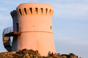The Genoa Tower on Marine d'Albo beach near Ogliastro at sunset, Corsica, France The Genoa Tower on Marine d'Albo beach near Ogliastro at sunset, Corsica, France