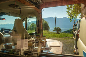 View of the Swiss mountain landscape from a motorhome. Buchs, St. Gallen, Switzerland View of the Swiss mountain landscape from a motorhome. Buchs, St. Gallen, Switzerland