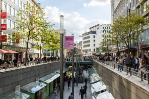 People bustle in the pedestrian zone of Hanover, Lower Saxony, Germany. People bustle in the pedestrian zone of Hanover, Lower Saxony, Germany.