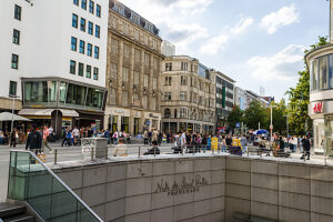 People bustle in the pedestrian zone of Hanover, Lower Saxony, Germany. People bustle in the pedestrian zone of Hanover, Lower Saxony, Germany.
