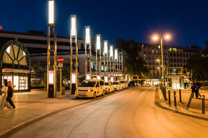 Cabs stand in a row on a street waiting for customers. Hanover, Lower Saxony, Germany. Cabs stand in a row on a street waiting for customers. Hanover, Lower Saxony, Germany.