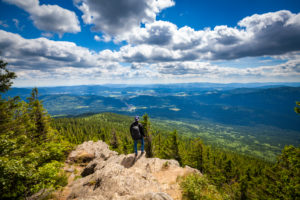 Europe, Germany, Bavaria, Bavarian Forest, National Park, Hiker standing at viewpoint Europe, Germany, Bavaria, Bavarian Forest, National Park, Hiker standing at viewpoint