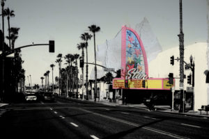 The Ocean highway in Oceanside with traffic and View to the cinema The Ocean highway in Oceanside with traffic and View to the cinema