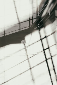 Abstract double exposure of the outer frame of a modern facade with shadows Abstract double exposure of the outer frame of a modern facade with shadows