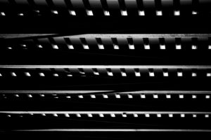 Detail of metal roof construction with steel joists and roof panels Detail of metal roof construction with steel joists and roof panels