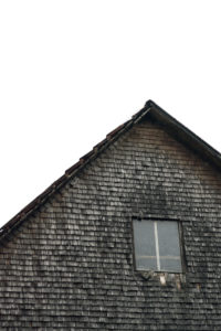gable, facade, windows, old shingles, grey and weathered on a wooden house in the Black Forest