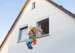 Woman throws her partner's clothes out of the window after the breakup Woman throws her partner's clothes out of the window after the breakup