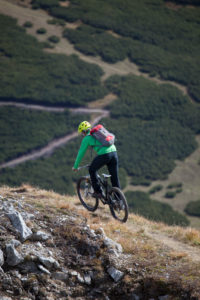 Mountain biker on the way to Peilspitze, Gschnitztal, Stubaier Alps, Tyrol, Austria