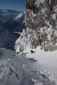 Ski touring downhill in Dammkar, near Mittenwald, Karwendel, Bavaria, Germany