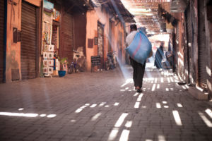 Medina market, man is carrying a sack, market, Medina, play of lights, ornaments, shadow, light beams, Marrakech, Morocco, Medina market, man is carrying a sack, market, Medina, play of lights, ornaments, shadow, light beams, Marrakech, Morocco,
