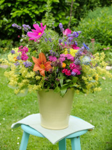 Colorful bouquet with lilies, lady's mantle, cosmea and lavender Colorful bouquet with lilies, lady's mantle, cosmea and lavender