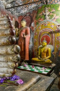 Statues and murals in the cave temple in Dambulla, Sri Lanka Statues and murals in the cave temple in Dambulla, Sri Lanka