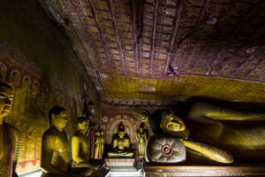 Statues and murals in the cave temple in Dambulla, Sri Lanka Statues and murals in the cave temple in Dambulla, Sri Lanka