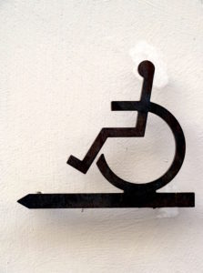 Wheelchair users, metal signs, Sign post for handicapped entrance at a church in Rosenheim, Upper Bavaria, Bavaria, Germany Wheelchair users, metal signs, Sign post for handicapped entrance at a church in Rosenheim, Upper Bavaria, Bavaria, Germany