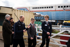 The Duke of Edinburgh talks to students Lucas Tuck and Michael Perkins who completed their volunteering section at Railworld last year during a visit to Railworld Wildlife Haven in Peterborough, Cambridgeshire.