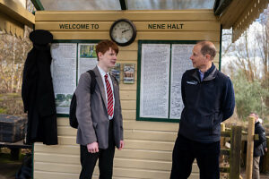 The Duke of Edinburgh talks to student Cameron Reed at Nene Halt station in Railworld last year during a visit to Railworld Wildlife Haven in Peterborough, Cambridgeshire.