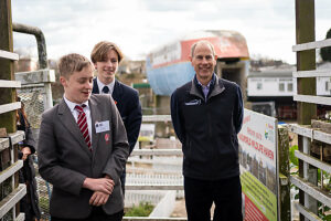 The Duke of Edinburgh talks to students Lucas Tuck and Michael Perkins who completed their volunteering section at Railworld last year during a visit to Railworld Wildlife Haven in Peterborough, Cambridgeshire.