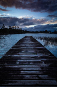 Evening mood and boardwalk on Lake Brunner, South Island New Zealand Evening mood and boardwalk on Lake Brunner, South Island New Zealand