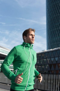 Sporty man jogging in the town, Frankfurt on the Main, Hessen, Sporty man jogging in the town, Frankfurt on the Main, Hessen,