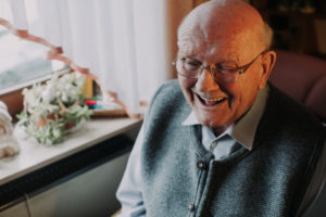 Old person laughing man